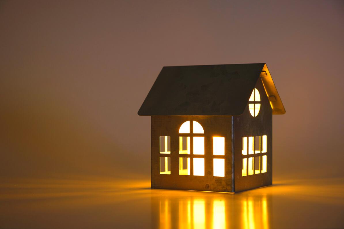 A model house with the lights turned on