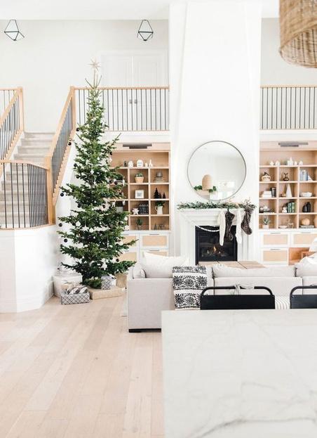 A living room tastefully staged for the holidays
